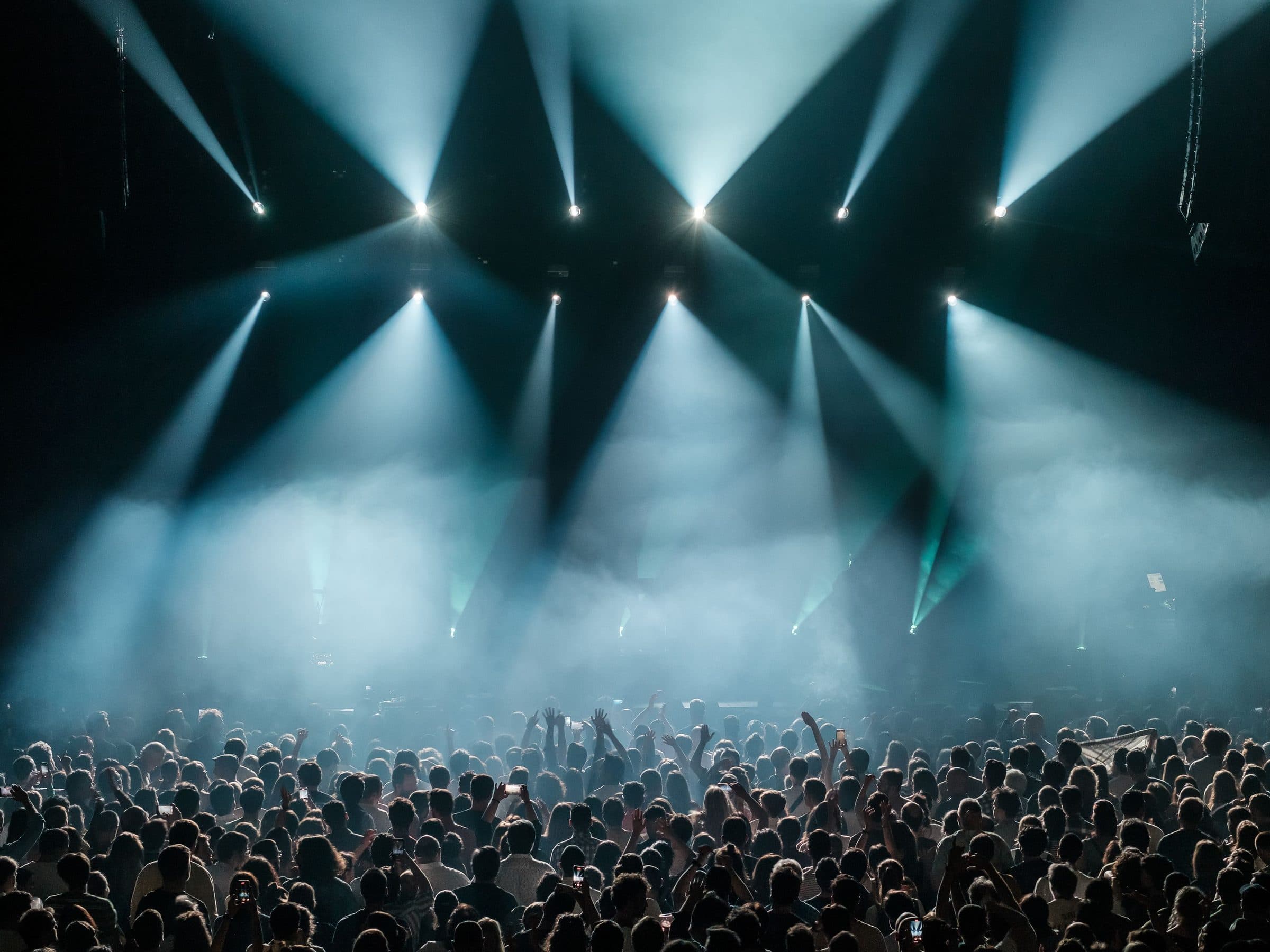 White beams over a packed floor